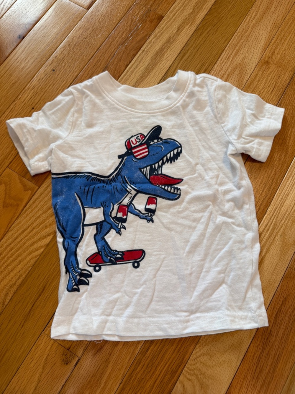 White Kids T-Shirt with Blue Skateboarding patriotic Dinosaur